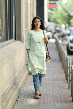 "Pastel green cotton kurti with pin-tuck detailing and blue contrast pants – Aayizhai Fashions"