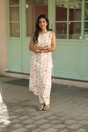 "Ivory cotton floral coord set with sleeveless kurti top and straight pants – Aayizhai Fashions"