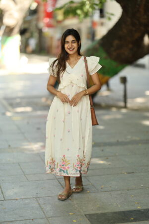 "Ivory cotton embroidered maxi frock with floral embroidery and flutter sleeves – Aayizhai Fashions"